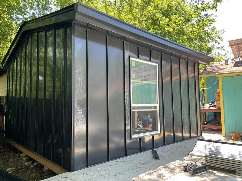 Black standing seam metal wall panels for Roof Inspection in Keystone