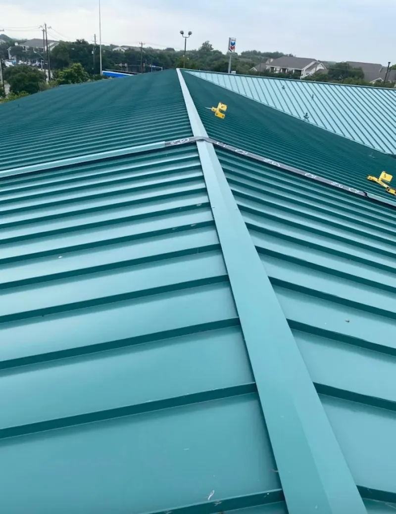 Green commercial metal roof ridge and valley for Metal Roof Repair in Keystone